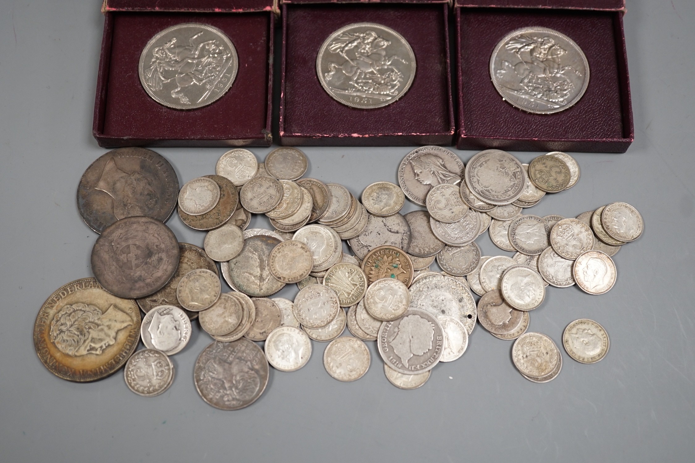 A collection of silver threepences and minor coins